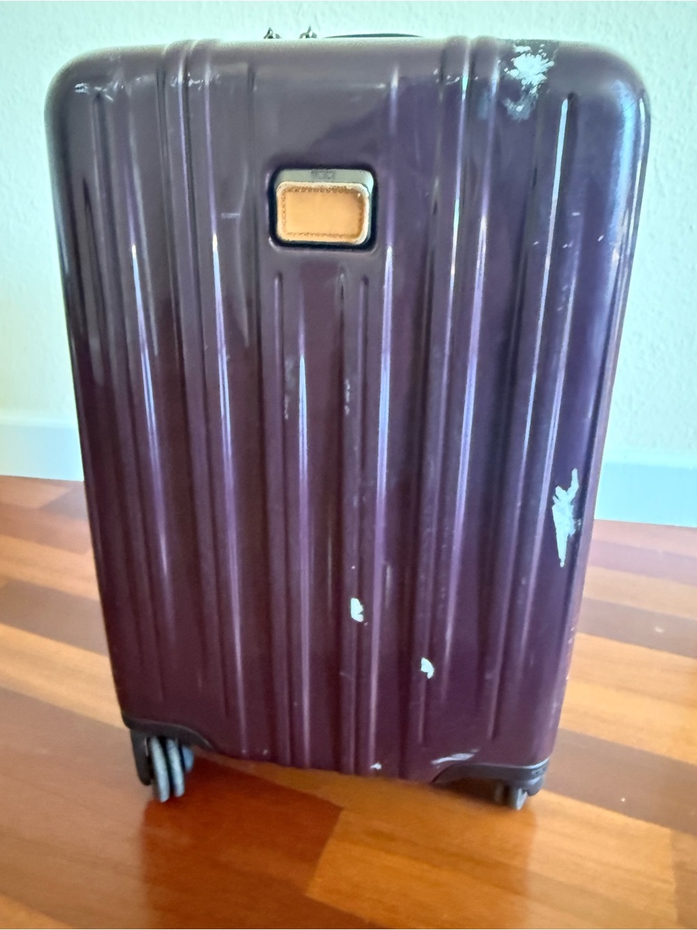 Tumi Plum Purple Hardshell Rolling Suitcase